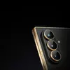 Miniatura della fotocamera Samsung W26 con anelli dorati