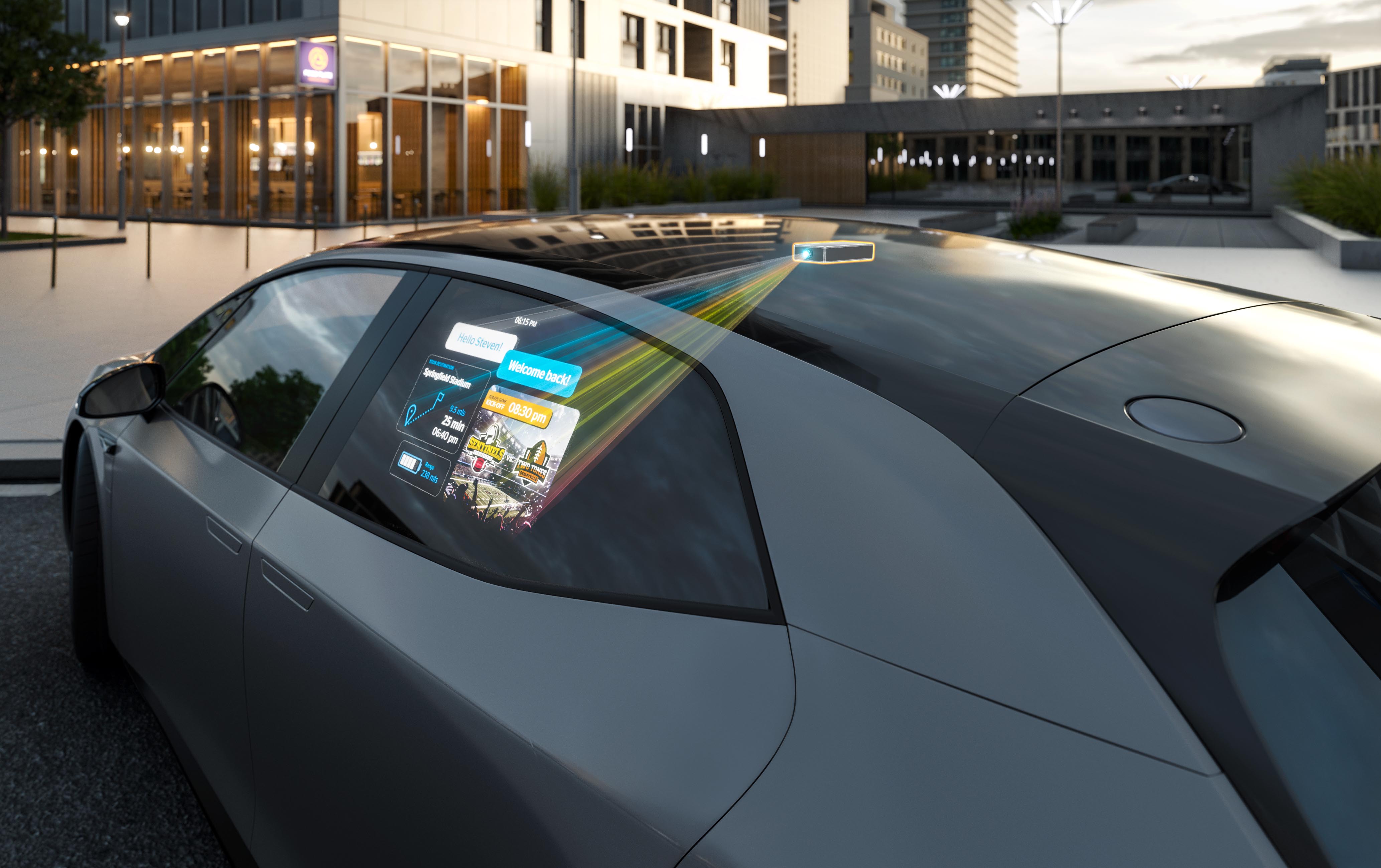 Unità di proiezione del sistema "Window Projection". Il mini-proiettore mostra l'immagine sul finestrino laterale dell'auto